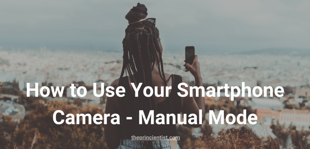 smartphone camera settings - featured image- black woman sits on top of a mountain and takes a photo of the view with her phone