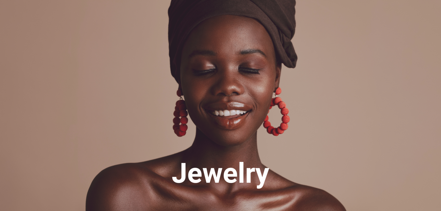 jewelry - black woman wearing huge red earrings