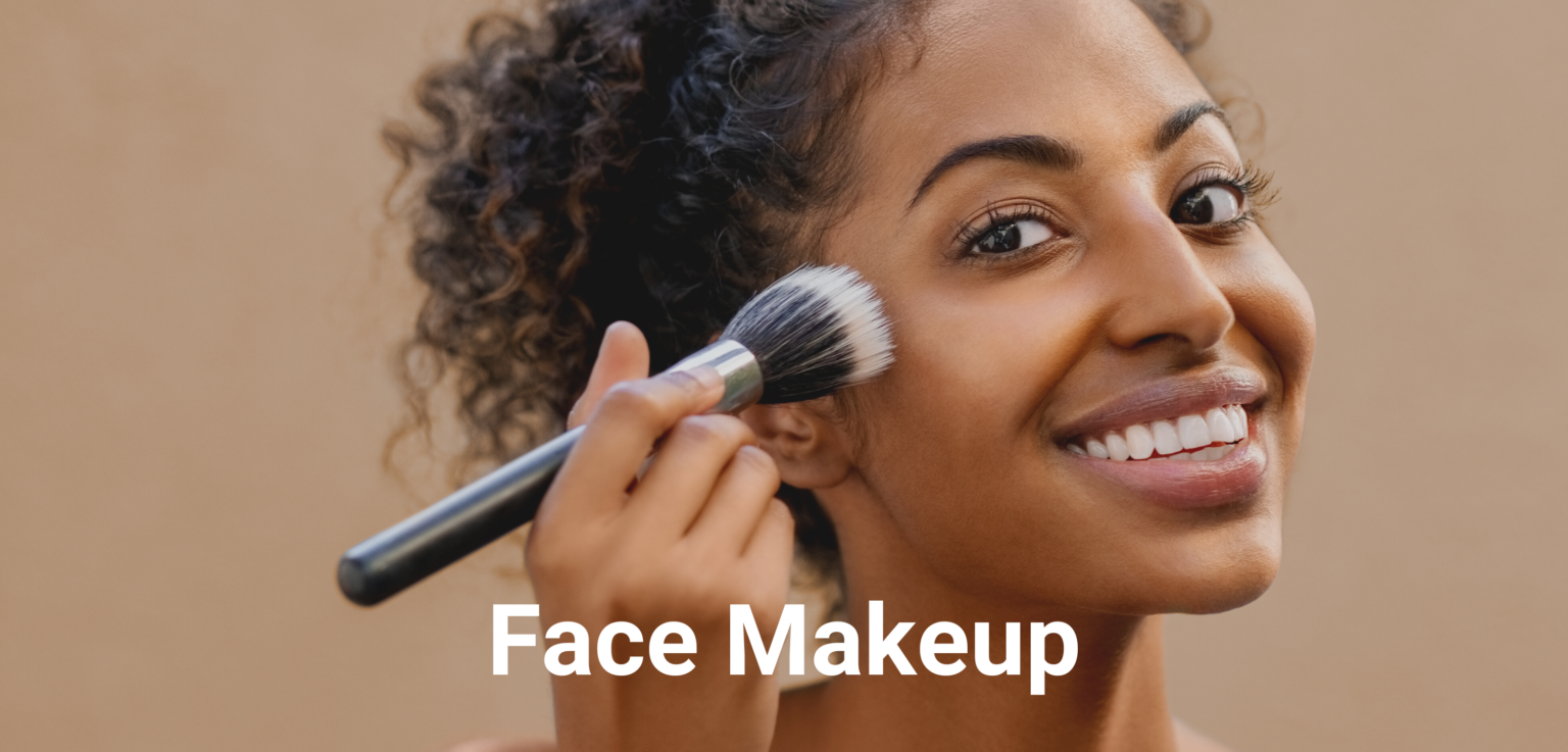 face makeup - a black woman using a large brush to apply face makeup