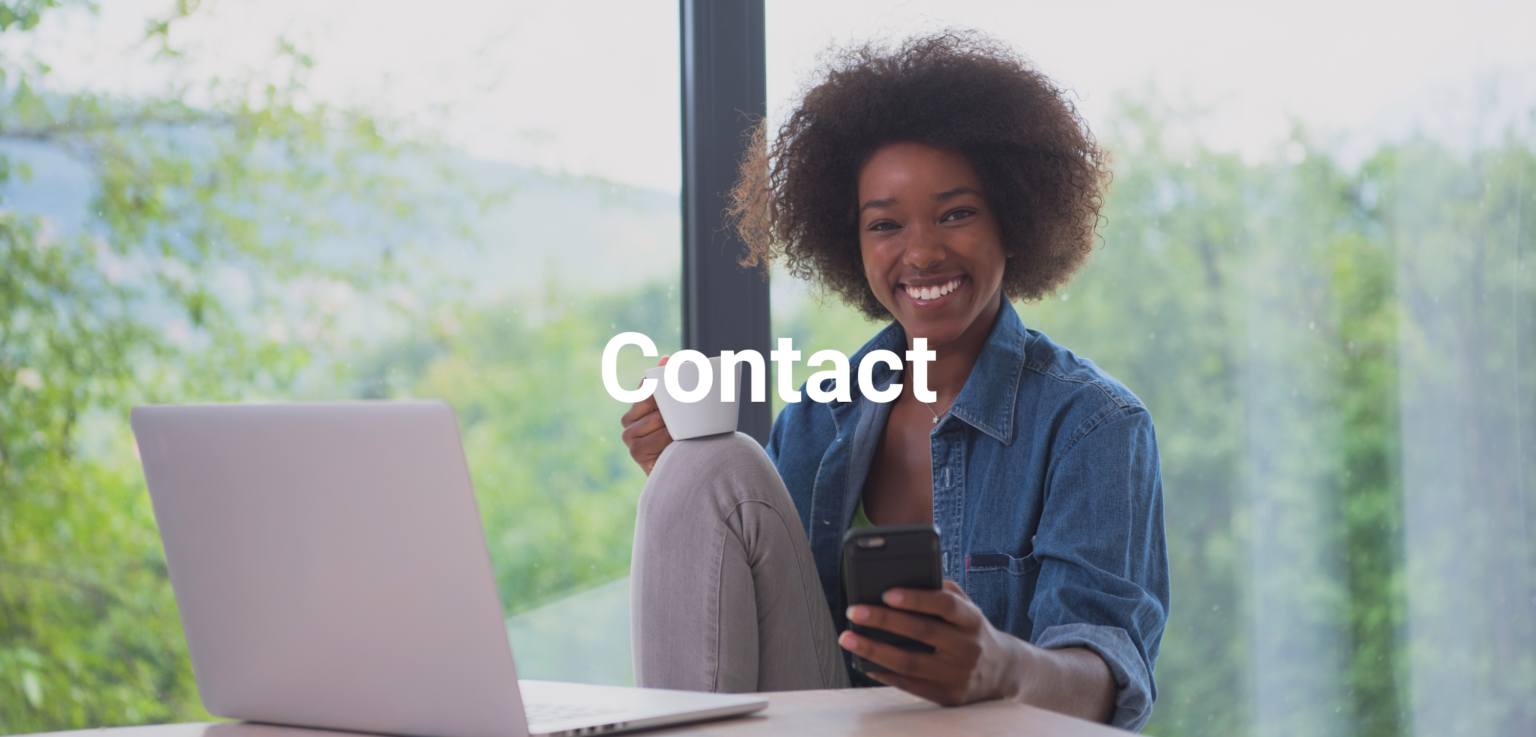 contact page - woman hapily using her phone to contact someone