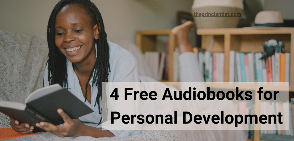 4 free audiobooks for personal development - featured image - black woman laying in her couch reading abook, she is smiling very happy