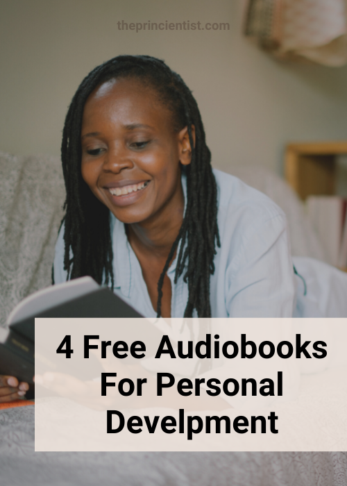 4 free audiobooks for personal development - featured image - black woman laying in her couch reading abook, she is smiling very happy