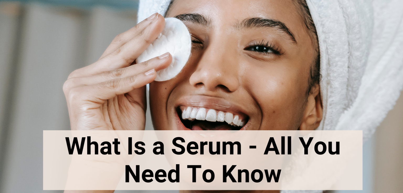 what is a serum - women applying a serum on her face with a cotton pad