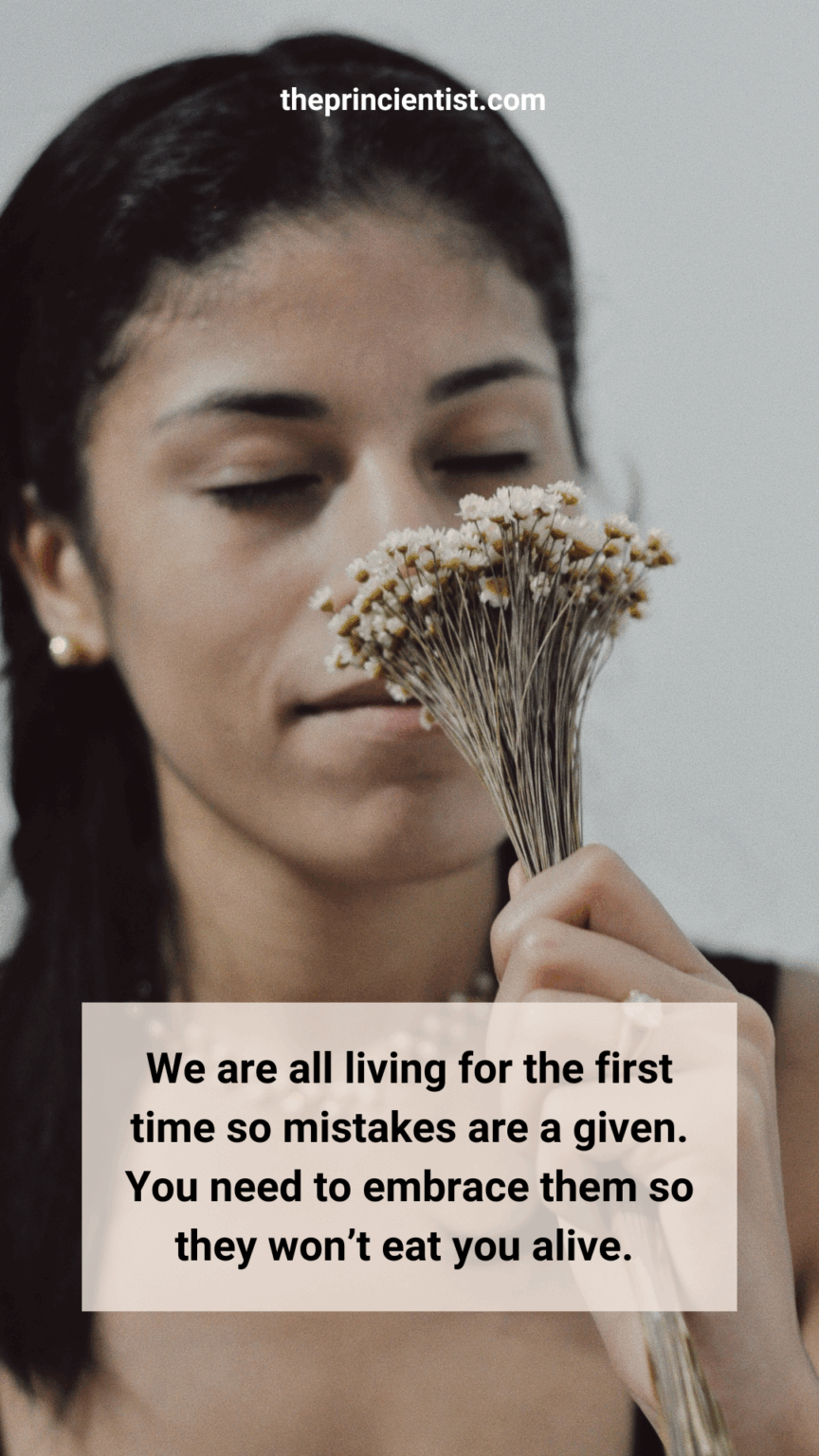 lessons from failure quote. woman holds a flower and smells it, signalling a new begining